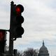 A red traffic light is seen near the US Capitol in Washington, DC on February 1, 2020.